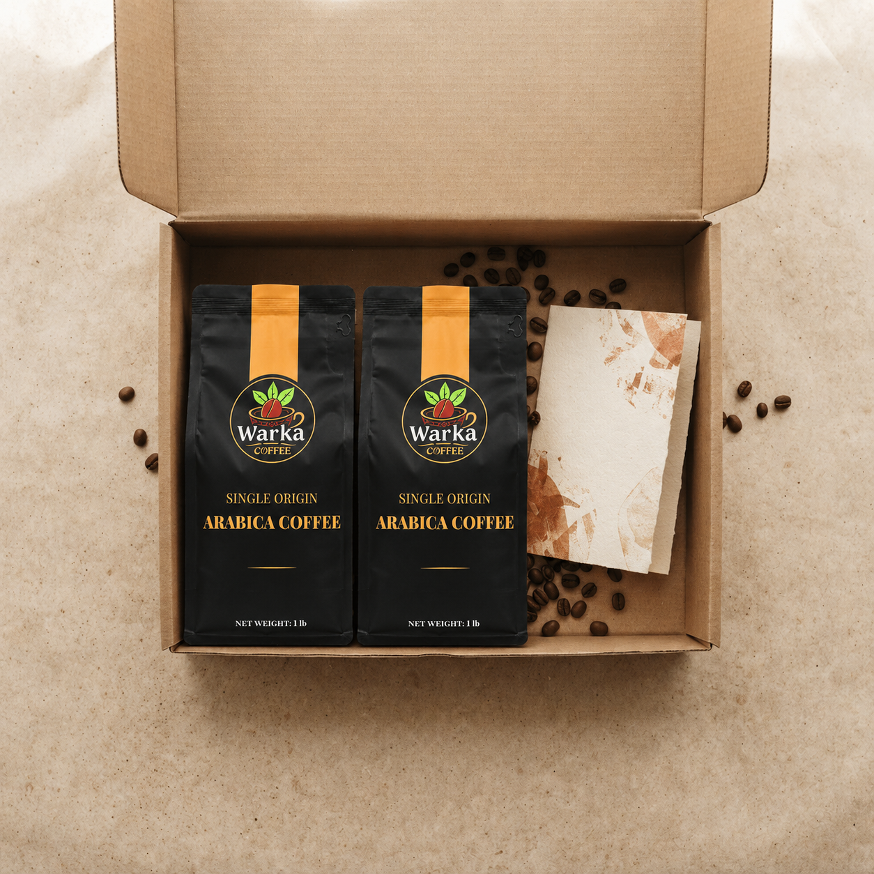 An open Warka Coffee shipment with two bags of coffee, roasted beans, and a tasting card